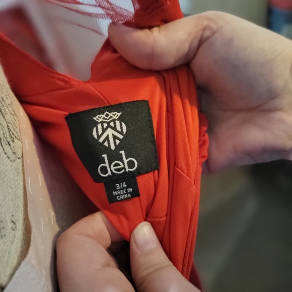 Stunning red prom formal with beaded collar. - Picture 4 of 7